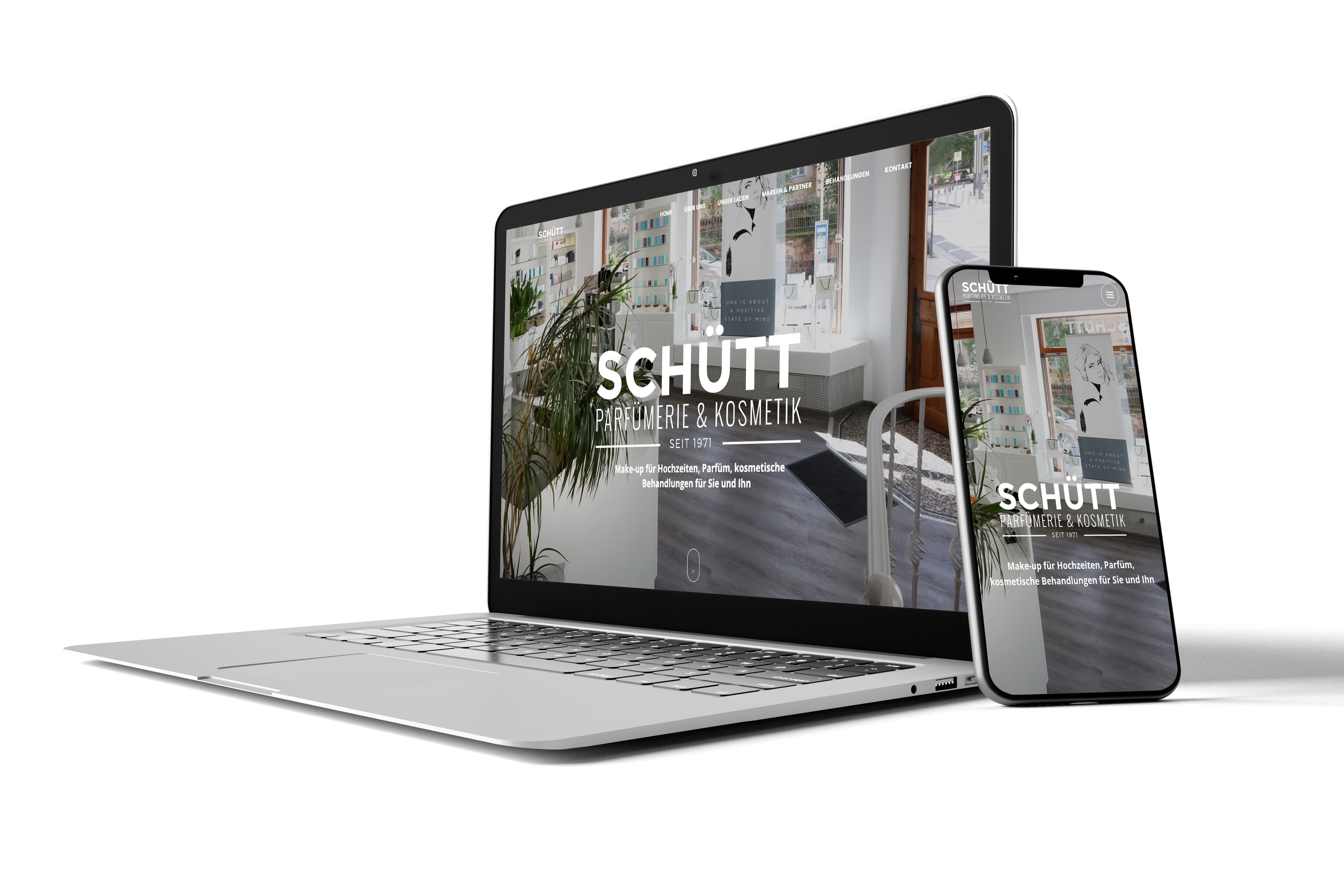 Moderner Webauftritt auf einem Laptop und Smartphone